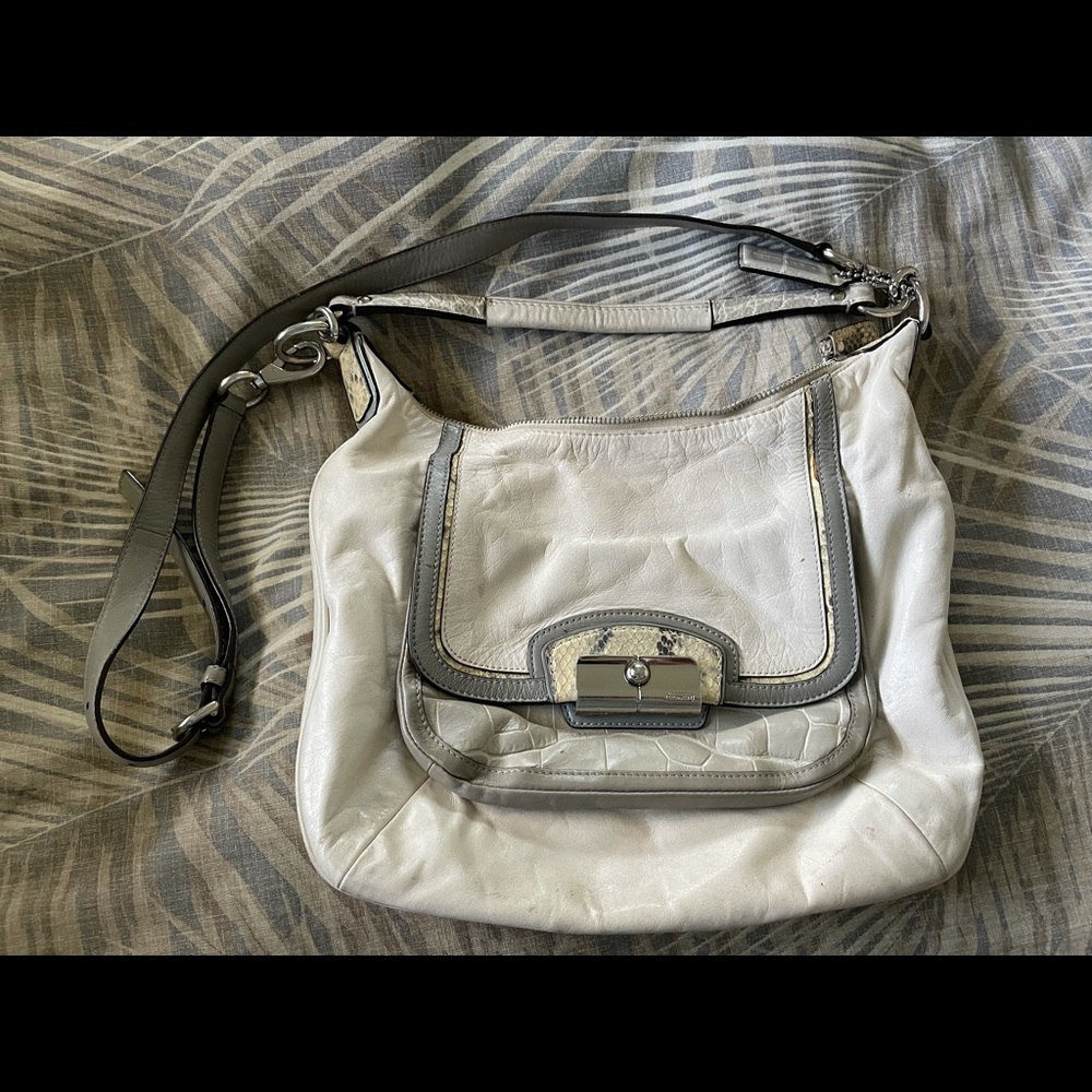 Grey and white Coach purse